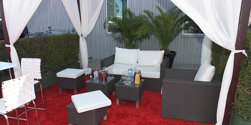 VIP Tailgate Cabana with open sides and furnitre